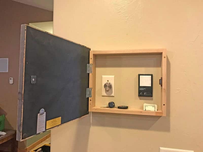 Behind A Wall Mounted Picture Frame
