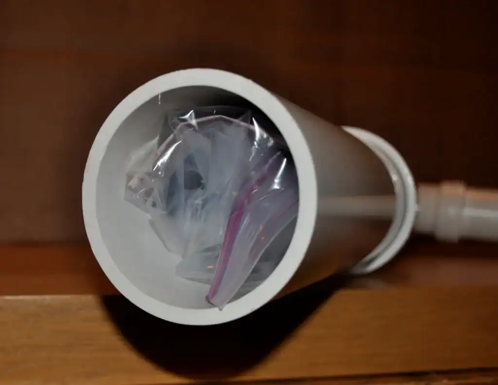 Under The Sink Inside A Fake Pipe