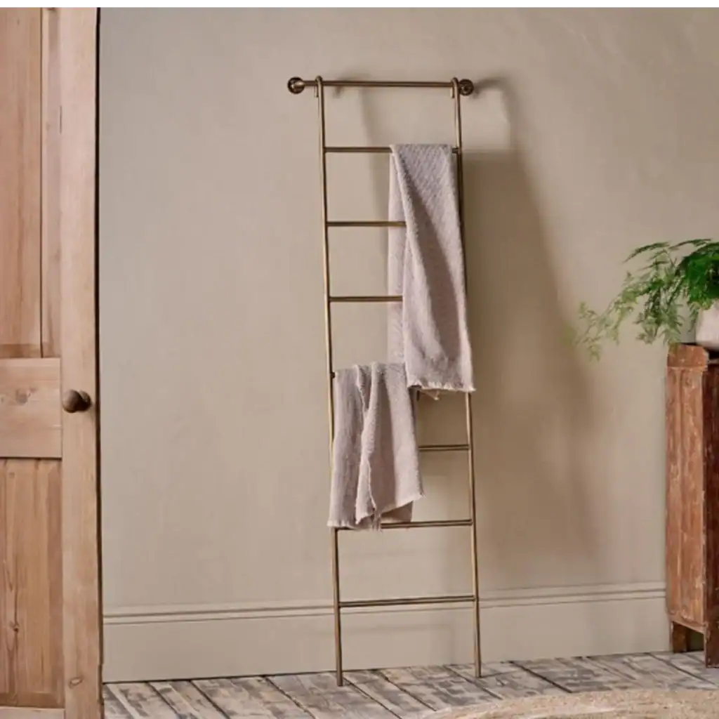 Use A Decorative Ladder For Fabric Keepsakes