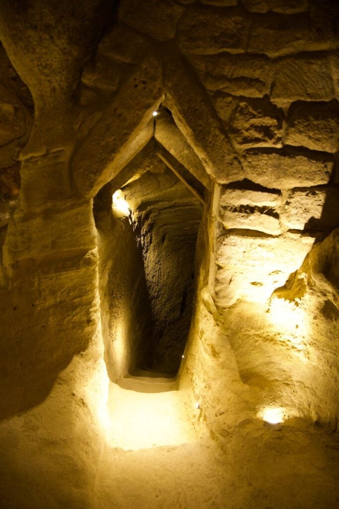 Discover the underground tunnels and caves of Cappadocia, Türkiye, beautifully lit and historic.
