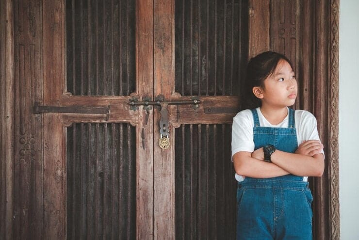 Cute Girl Looking Away While Standing Door 1048944 4676161