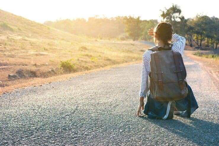 Full Length Rear View Girl With Backpack Sitting Road 1048944 2571515