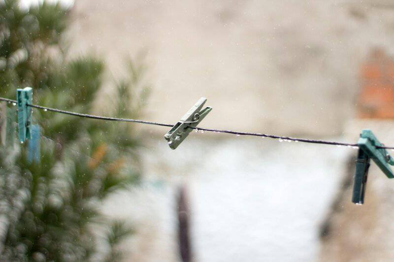 27. Clotheslines Fluttering in Backyards
