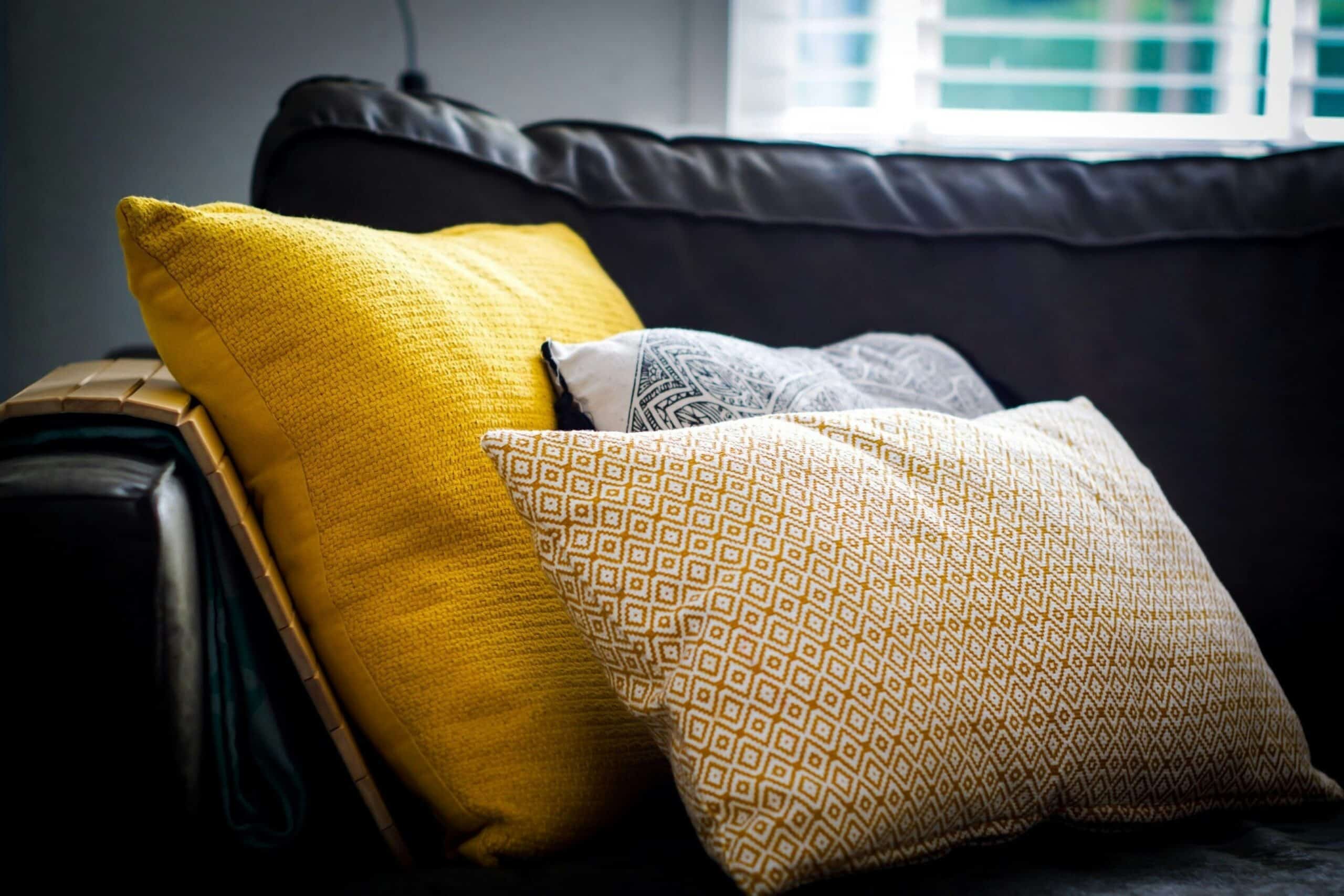 9. Upgrade Throw Pillows